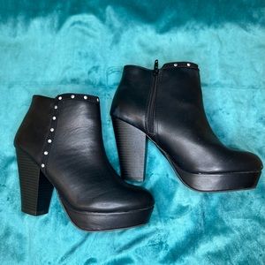 Report heeled booties